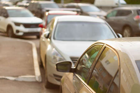 Automobile congestion. Traffic jam. Problems with parking spaces in the yard.