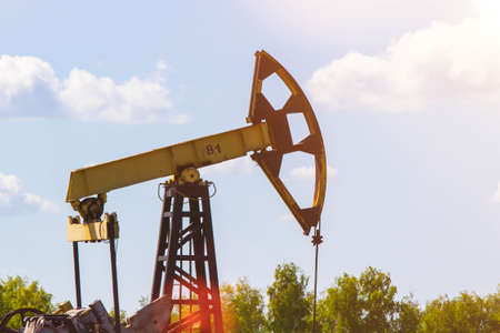 oil injection. oil production plant. gas production. oilfield site. Drilling rigs for the extraction of fossil fuels and crude oil. global crisis. War on oil and gas prices.の写真素材