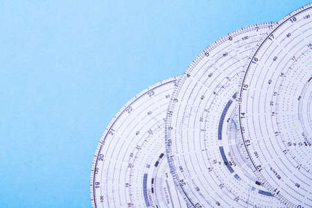 Tachograph. Driver time tracking. Fixing the movement of the car. Cargo transportation with driving according to the schedule. Time disk. Background from recorded analog tachograph disks.の写真素材