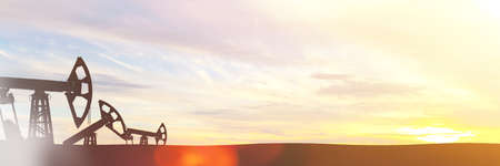 Oil is pumped at sunset. Limiting oil prices. A working oil production plant. Increasing the shares of the plant.の写真素材