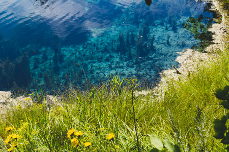 Lake with gray water. Blue lake in Samara region in Russia. Deep pond. Smell of hydrogen sulfide.の写真素材