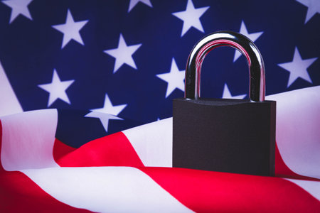 Bitcoins in the USA. Cryptocurrency ban in America. The growth of the exchange rate. Usa flag and bitcoin coin.の写真素材