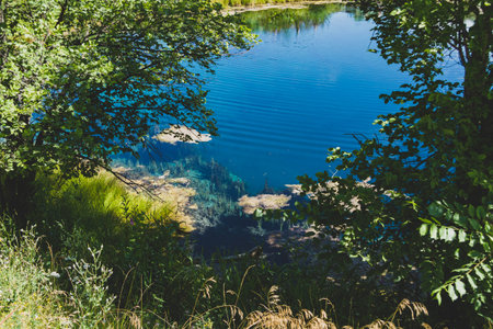Lake with gray water. Blue lake in Samara region in Russia. Deep pond. Smell of hydrogen sulfide.の写真素材
