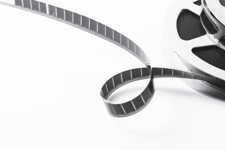 Vintage film strip isolated on white background. Film footage on film. Analog cinema. Old cinema.の写真素材