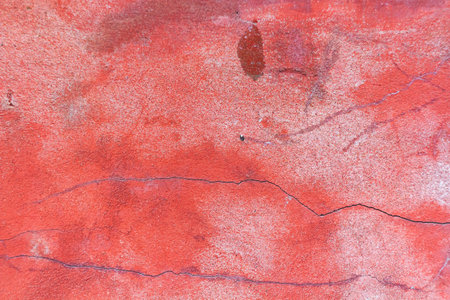 Old wall with deep cracks. Texture of stone and broken concrete. Grunge texture of ruined wall..の写真素材