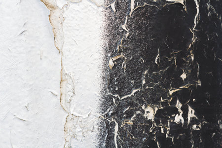 Old cracked paint. Grunge wall. The texture of the wall with deep cracks..の写真素材