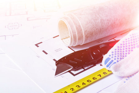 Building plan. Linoleum and flooring installation tools. Repair in the house..の写真素材