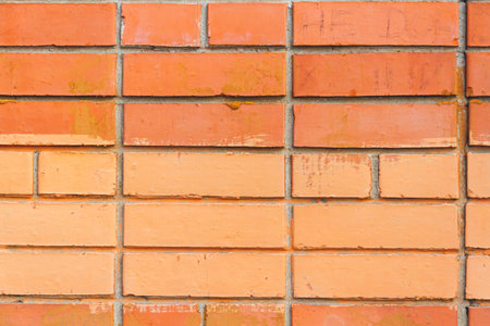 Red brick wall texture with smooth stone blocks. High-quality texture..の写真素材
