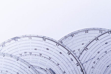 Tachograph. Driver time tracking. Fixing the movement of the car. Cargo transportation with driving according to the schedule. Time disk. Background from recorded analog tachograph disks.の写真素材
