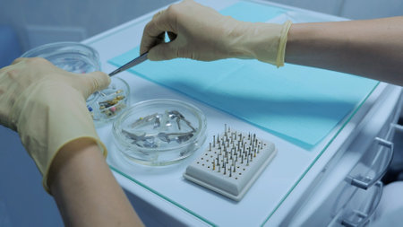 The dentist cleans his teeth. Teeth whitening. Dentist visit. dental instruments