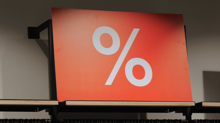 A big red sign with a percentage sign. White percent sign on a red background. big saleの写真素材