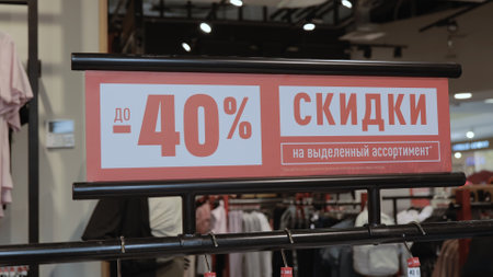 40 percent discount sign. Close-up of signboard, 40 percent discount, sale, mall. Translation: Discounts, on selected assortment Tomsk, Russia 10/21/2022のeditorial素材