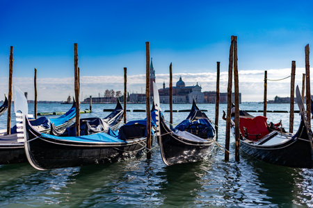 Venice, its characteristic architecture and gondolas, which enrich its magnificent scenery, and view of the church of San Giorgio Maggiore.の写真素材
