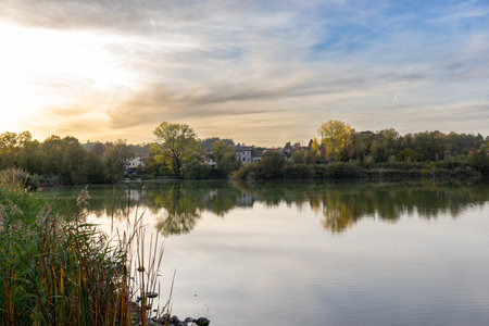 Lake of Sartirana (Italy), with view of Mount Resegone. A small park with a small lake, with a beautiful panorama of Orobic hills and pre-Alps, in particular Mount Resegone.の写真素材