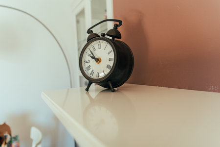 A perfect alarm clock, vintage. An alarm clock with a linear and classic design.の写真素材