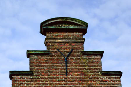 Fragment of a gable of historical monumental house in the center of Monnickendam, Netherlands