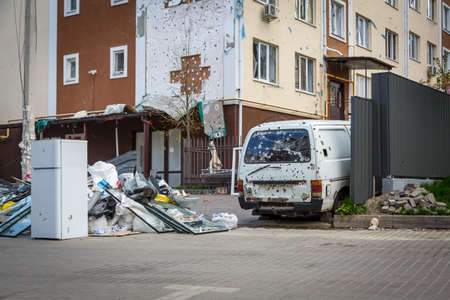 Cars in Irpin. May, 2022. Irpin, Kyiv region, Ukraine. Russia Ukraine war. Damaged in Irpin after fightingのeditorial素材