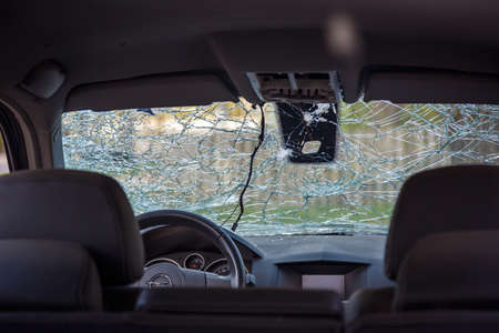 Cars in Irpin. May, 2022. Irpin, Kyiv region, Ukraine. Russia Ukraine war. Damaged in Irpin after fightingのeditorial素材