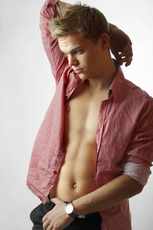 Portrait of sexy male model isolated on white backgroundの写真素材