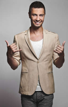 Portrait of sexy happy man modelの写真素材