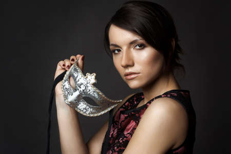 beautiful sexy young woman with maskの写真素材