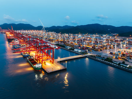 Aerial view of container terminal and shipyard at dusk in Hong Kong