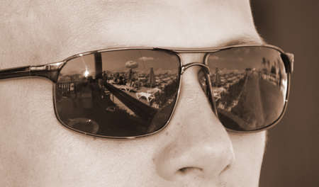 Closeup portret of men in sunglasses on sunny daysの写真素材