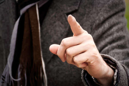 Businessman pointing at camera with his finger.の写真素材