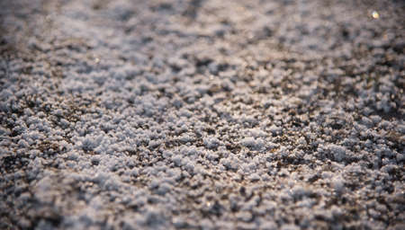 Natural background of snow and frost on the surface in a frosty Sunny morning