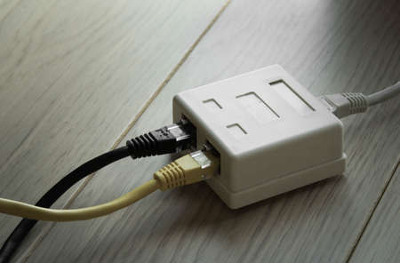 network cables and hub closeup on natural backgroundの写真素材