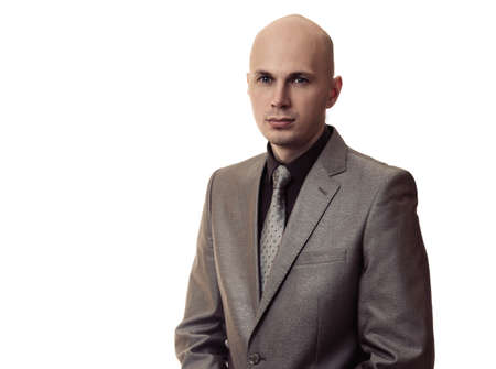 business man in a suit thinking isolated on white backgroundの写真素材