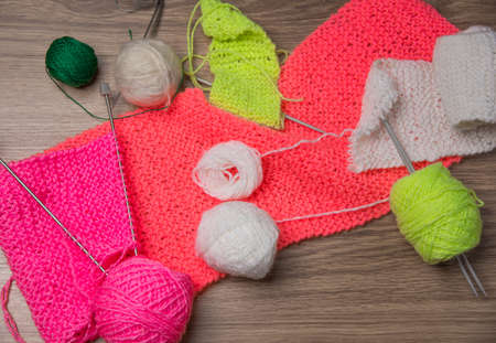 yarns, wool, knitting needles closeup on dark backgroundの写真素材