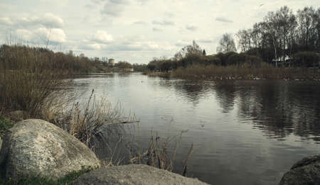 artificial dam to Store water for the dry season on the background of the city