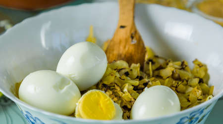 white bowl with roasted cabbage for a piesの写真素材