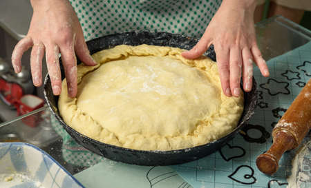 women's hands are smeared with oil a pieの写真素材