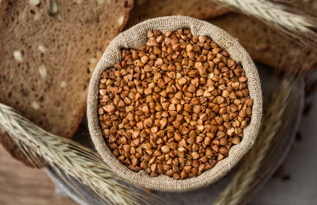 buckwheat in a linen bag in the background grain breadの写真素材