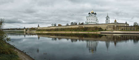 panorama of the river and Pskov Kremlin in the fog on a grey backgroundの写真素材