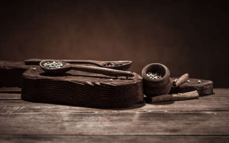 coffee and star anise on a wooden Board on the brown background on magic Christmas holidayの写真素材