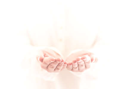 Empty cupped woman hands on white backgroundの写真素材