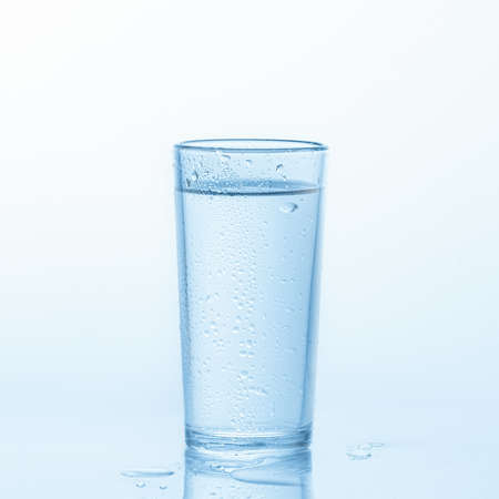 Glass of Water isolated on a white background.