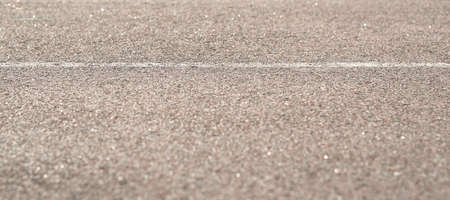 Texture of road asphalt with markup. The foreground in the blur.の写真素材