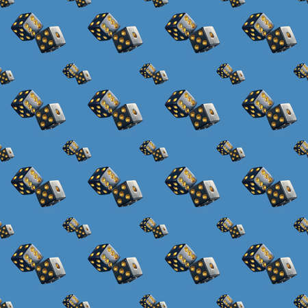 Seamless pattern of dice big and small on blue background.の写真素材