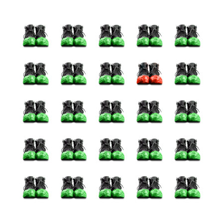 Pattern of black leather mens shoes in green overshoes isolated on white background. One pair of...