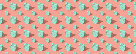 Horizontal illustration of green alarm clocks big and small with shadow on pink background. set. seamless texture pattern. 3D illustration.の写真素材
