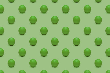 Horizontal seamless pattern of fresh green oranges on green background. Pop art design, creative summer concept.の写真素材