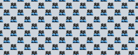 Horizontal banner of seamless pattern of black leather mens shoes in blue overshoes isolated on...