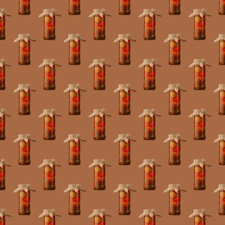 Square seamless pattern of glass jars with canned tomatoes is isolated on brown background.の写真素材