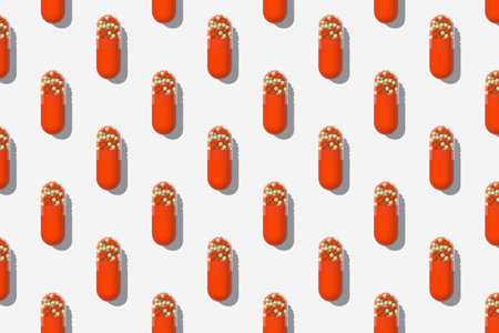 Horizontal seamless pattern of 3D red pills on a white background. The concept of fighting coronavirus.の写真素材