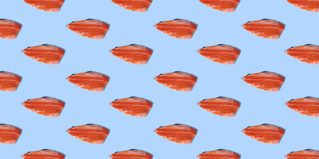 Horizontal seamless pattern of trout fillets isolated on blue background.の写真素材