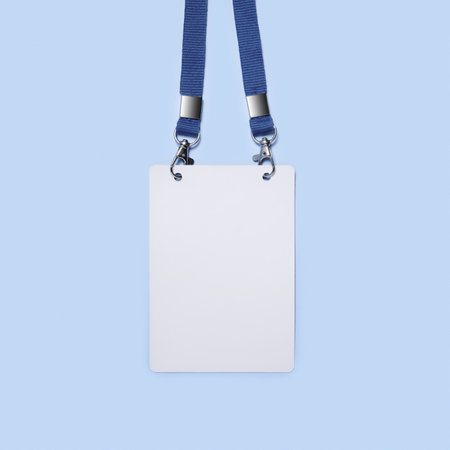 Square shot of badge isolated on a blue background. Photo with copy space.